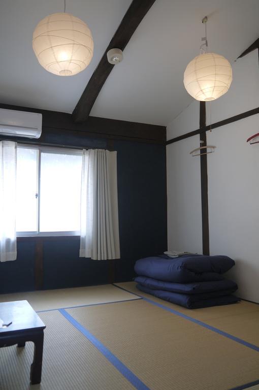 Minatoya Guesthouse Iki Kamer foto